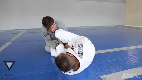 Triangle Choke Setup from Open Guard, Yuri Simoes, Jits Magazine triangle choke setup from open guard, yuri